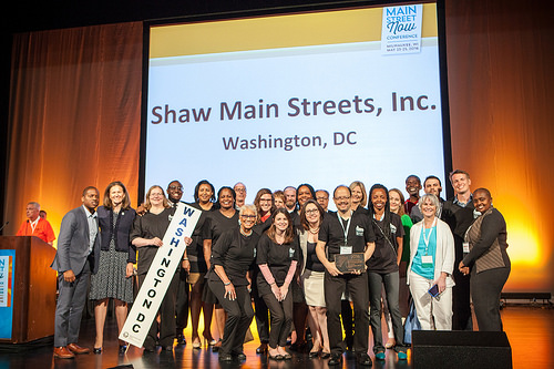 Members of Shaw Main Streets, Inc. accepting the 2016 Great American Main Street Award. 
